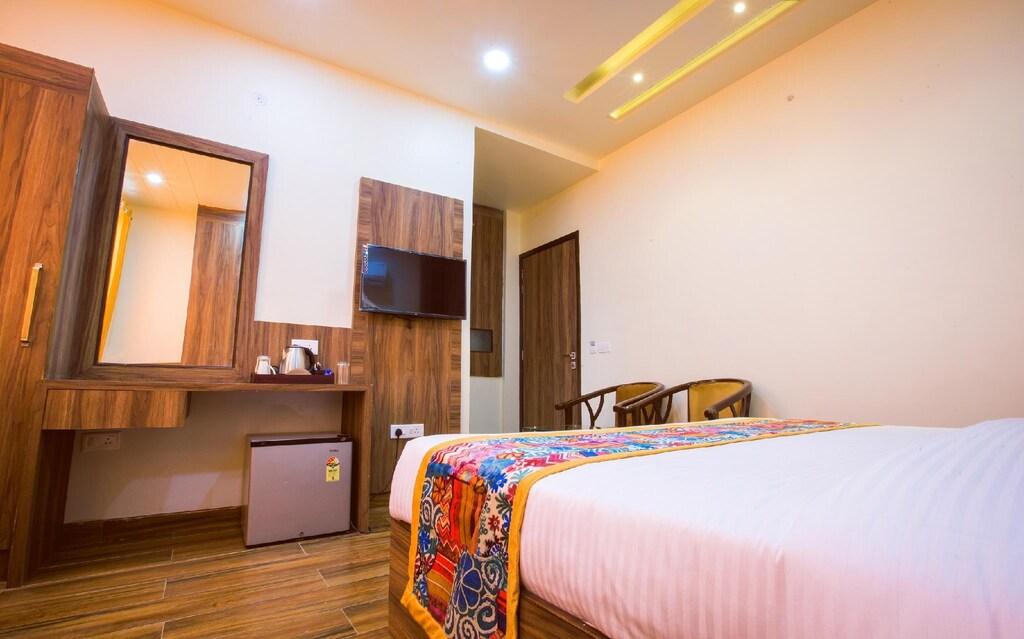 a bedroom with a large bed at hotel shivaay grand in Amritsar hotel_Image
