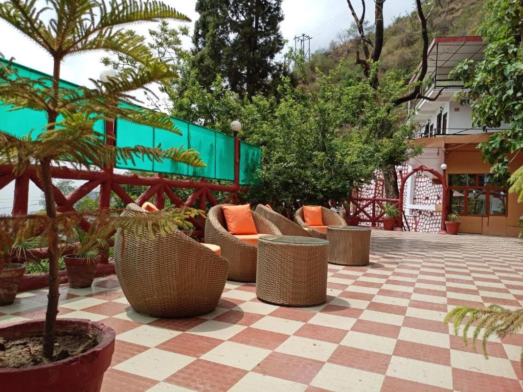 facade with seating area at ceyone classic fall in mussoorie hotel_Image