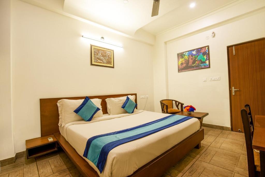 a bedroom at Elite Suites Mint Gomti Nagar in Lucknow hotel_Image