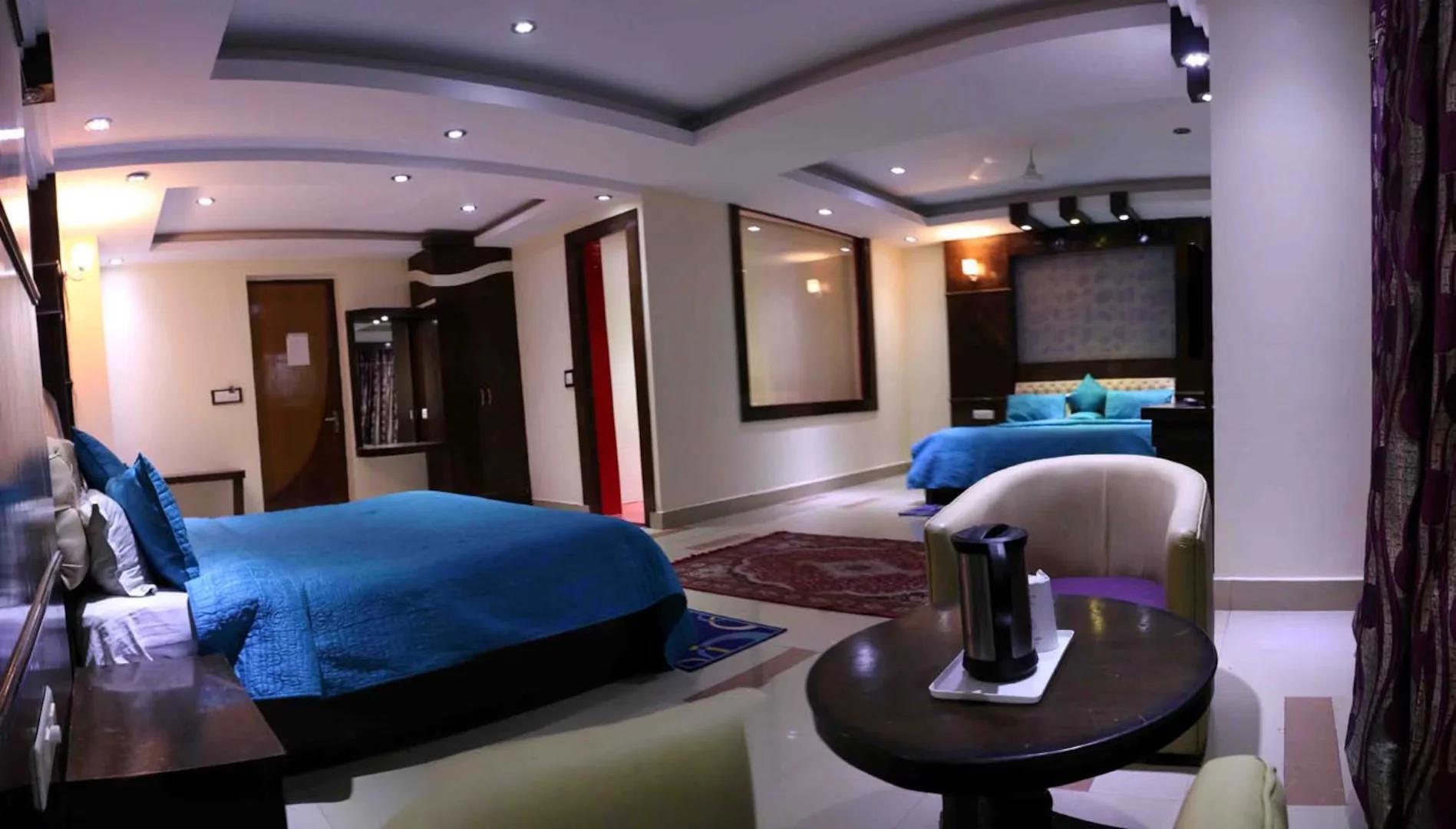 a double bed room with t.v at hotel raj mandir in haridwar hotel_Image