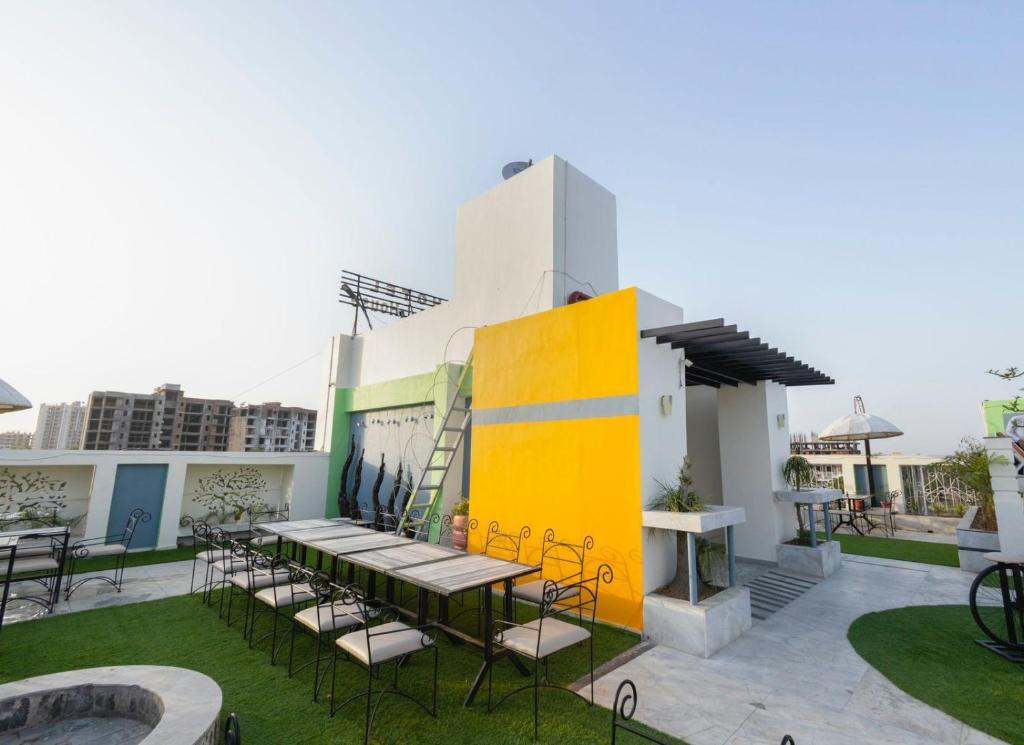a front view of hotel at Hotel Sahibs LightHouse in Agra hotel_Image