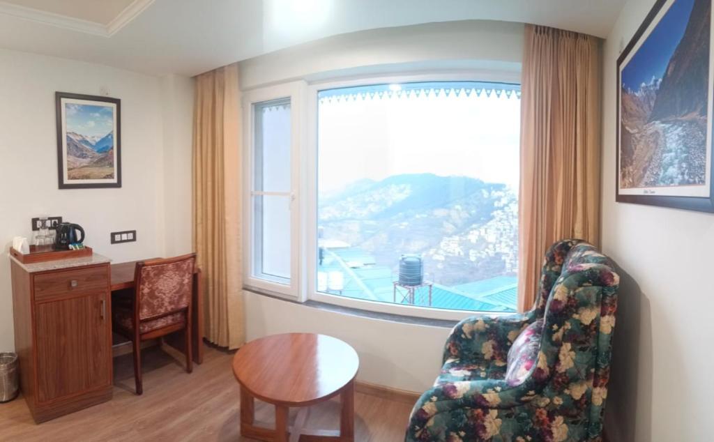 seating area at hotel greenfield regency in shimla hotel_Image