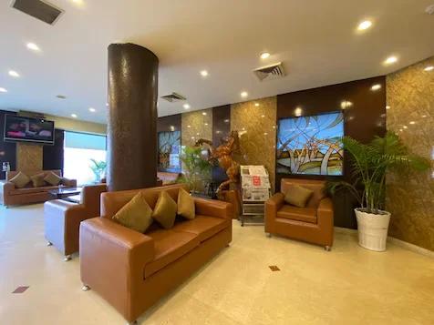 a reception area with sofa and plants at the raas mahal hotel in jaipur hotel_Image